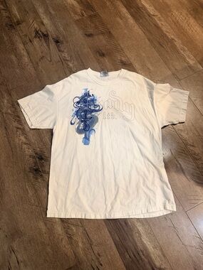 White Short-Sleeve Graphic Tee with Blue Crest Detail